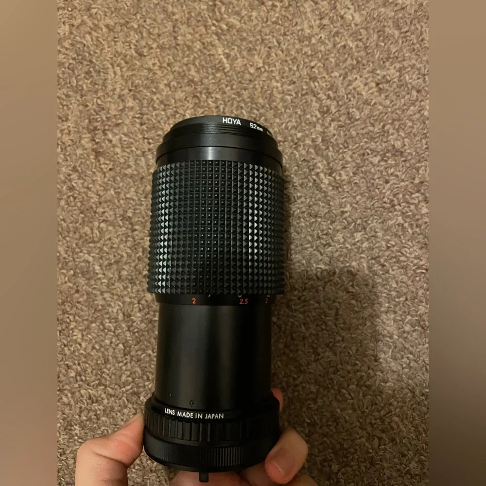auto rakunar camera lens with hoya 52mm lens